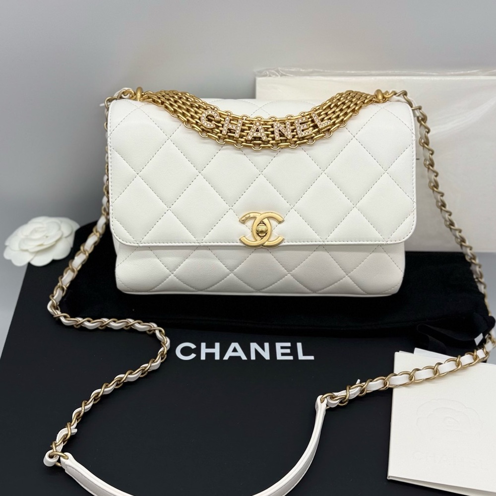 Authentic NEW Chanel white quilted lambskin crystal logo top handle flap handbag